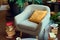 A gray reading chair with a yellow cushion and many books next to it in a room with houseplants.