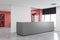 Gray reception desk in white office