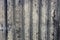 Gray ribbed background of a concrete wall part of a private building