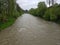 Gray river in the suburbs, floods