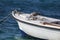 Gray seagull stands on a fishing boat