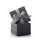 Gray shiny open gift box with satin bow