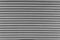 Gray siding texture in horizontal lines building material closeup background