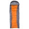 Gray sleeping bag with orange stripe arranged on white background, oriented vertically, isolate