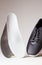 Gray sport shoes  with orthopedic insoles. Foot care products conception