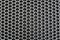 gray steel sheet composed of small honeycomb-like cells