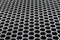 gray steel sheet composed of small honeycomb-like cells