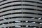 Gray striped metallic texture of the grate