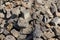 Gray texture of pieces of concrete and stones in a pile of garbage