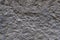 Gray textured plastered wall. Abstract pattern