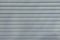 Gray vinyl siding. Background and texture of plastic siding