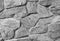 Gray wall from large stones background texture, grey stone slate wall concrete grout, rock