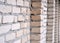 Gray wall of long bricks