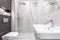 Gray and white bathroom with shower