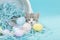 Gray white tan calico tabby kitten playing easter basket