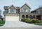 Gray Wood Sided House with Arched Porch