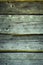 Gray wooden background from old logs in the wall. creative artistic backdrop in rustic grunge style