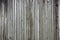 Gray wooden background of old worn boards