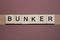 gray word bunker made of wooden square letters
