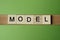 Gray word model made of wooden square letters