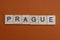 Gray word prague made of small wooden letters