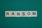 Gray word ransom made of wooden square letters