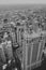 Grayscale aerial shot of the city of Chicago under a hazy sky