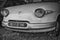 Grayscale front view of a rare French oldtimer of the brand Panhard & Levassor in Cologne, Germany