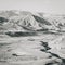 Grayscale shot of a car driving around Azat Reservoir surrounded by hills in Armenia