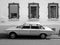 Grayscale shot of a four-door German sedan of the economic miracle era with a panoramic window