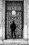 Grayscale shot of Islamic architectural window