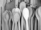 Grayscale shot of plastic spoons