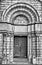 Grayscale vertical shot of the entrance of the Cathedral Basilica of Saint Louis