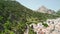 Grazalema, Andalusia. Aerial view of whitewashed houses sporting rust-tiled roofs and wrought-iron window bars