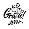 Grazie - thank you in Italian. Calligraphy inscription, black word on white background. Handwritten note