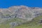 Grazing flocks of sheep high in the mountains.