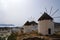 Gre, the island of Ios, two windmills overlooking the sea.