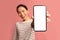 Great App. Cheerful Asian Female Demonstrating Smartphone With Blank White Screen