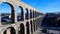 Great aqueduct in Segovia, historical buildings, roman structures