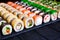 Great assortment of tasty multicolored maki sushi rolls, selecti