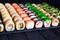 Great assortment of tasty multicolored maki sushi rolls, selecti