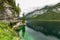 Great azure alpine lake Vorderer Gosausee. Picturesque and gorgeous rain clouds