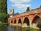 Great  Barford  Packhorse Bridge and All Saints Church  Tower. Bedfordshire England.