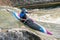 Great Britain Canoe Slalom athlete training on large drop on white water course