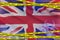 Great britain flag and Covid-19 quarantine yellow tape. Coronavirus or 2019-nCov virus concept