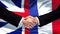 Great Britain and France handshake, international friendship, flag background