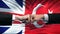 Great Britain vs Turkey conflict, fists on flag background, diplomatic crisis