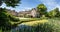 Great Chalfield Manor House and moat in Great Chalfield, Wiltshire, UK