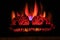 great closeup view of indoor fireplace with flame on dark, halloween background