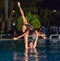 Great closeup view of professional Cuban dancers at night show in watter pool